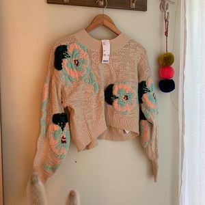 Cropped sweater with embroidered chenille flowers